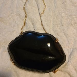 Black lip clutch/ purse